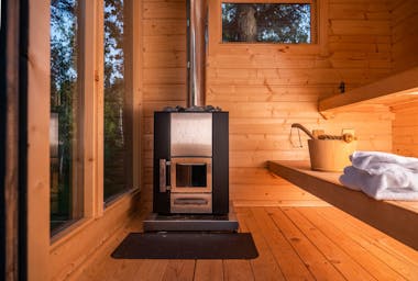 Wood fired sauna vs electric heated sauna